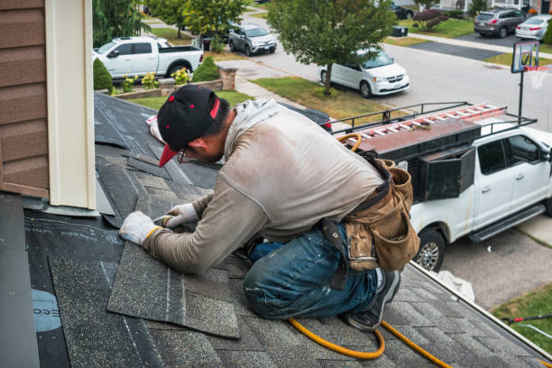Professional Metal Roofing technician working in Mims, FL